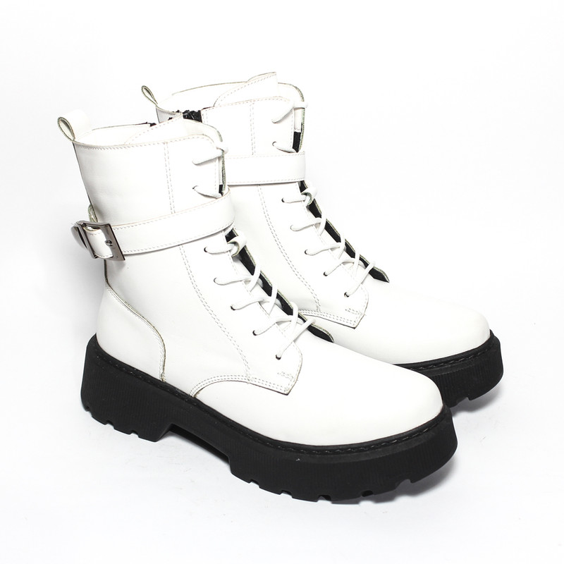 Half black store half white boots