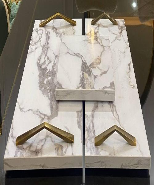 A set of three-piece infinity marble serving trays - a decorative piece and a wonderful aesthetic touch for your home from Maz Design