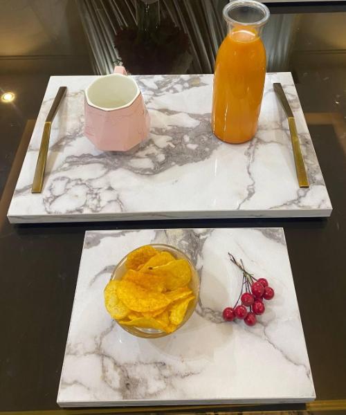 A set of three-piece infinity marble serving trays - a decorative piece and a wonderful aesthetic touch for your home from Maz Design