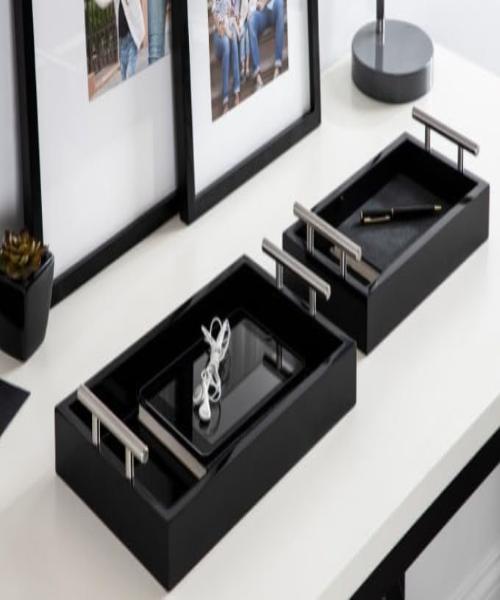 A set of two-piece wooden serving trays painted in a distinctive black color, ideal for displaying your decorative style while saving space in your home, inspired by modern aesthetics