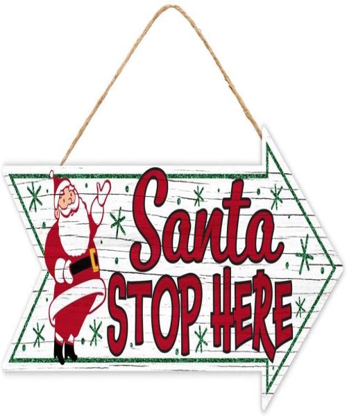 White and red Santa Claus arrow sign
