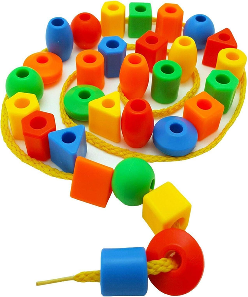 The little innovator cut plastic to combine beads to form multiple shapes