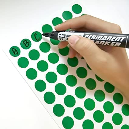 Green colored circular adhesive stickers