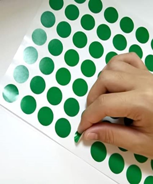Green colored circular adhesive stickers