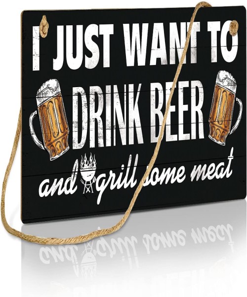 Wooden sign printed with “I Just Want To Drink Beer”
