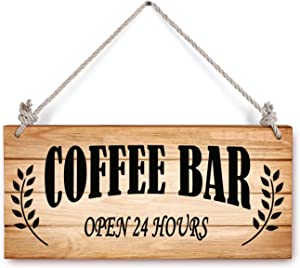 A sign posted titled Coffee Bar Open 24 Hours