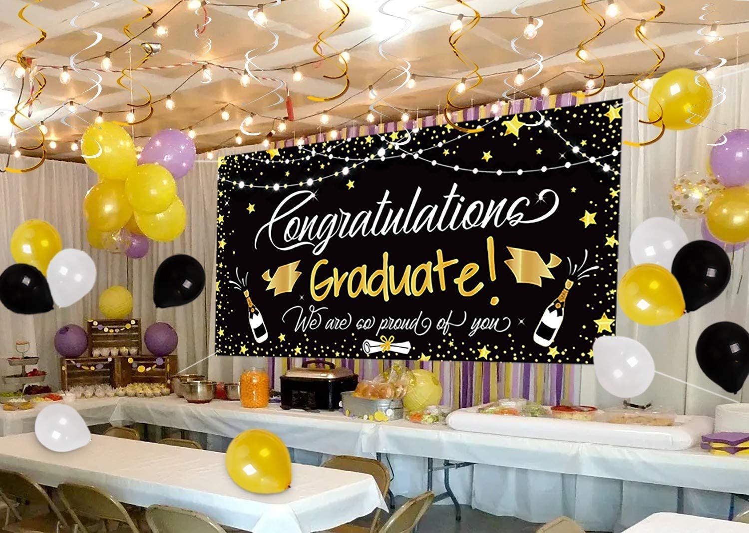 Graduation party poster and decorations, including balloons and a large background banner to congratulate the graduation