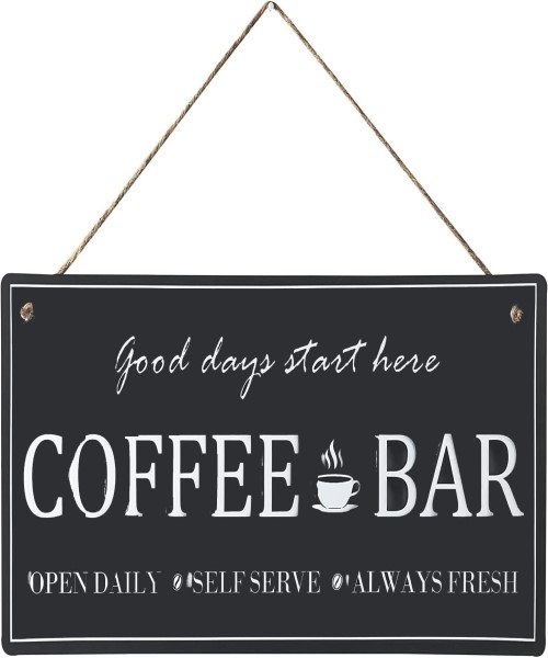 A wooden sign hanging for the coffee corner, printed with the phrase (Coffee Bar Good Days Start Here)