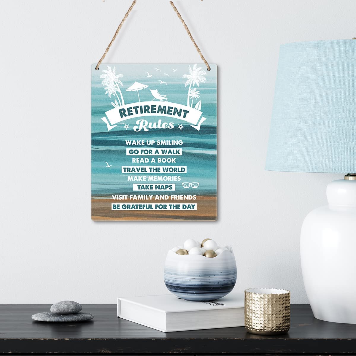 A wooden sign hanging on the wall with encouraging phrases for retirement 30x20 cm - Multi Color